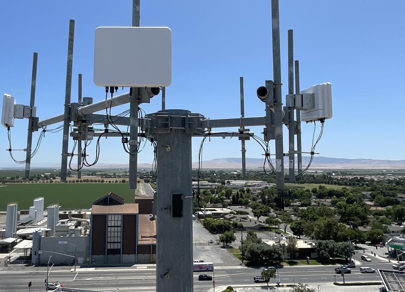 CVI radios on top of a tower overlooking Los Banos and the valley